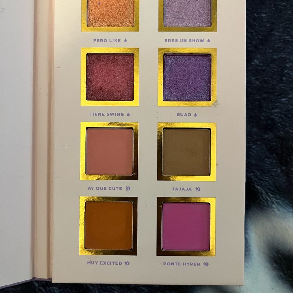 Gold and Purple Eyeshadow Palette with Shimmer and Matte Finishes